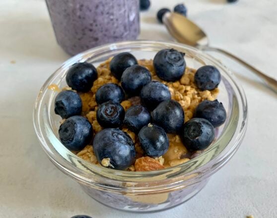 blueberry muffin overnight oats in a glass jar